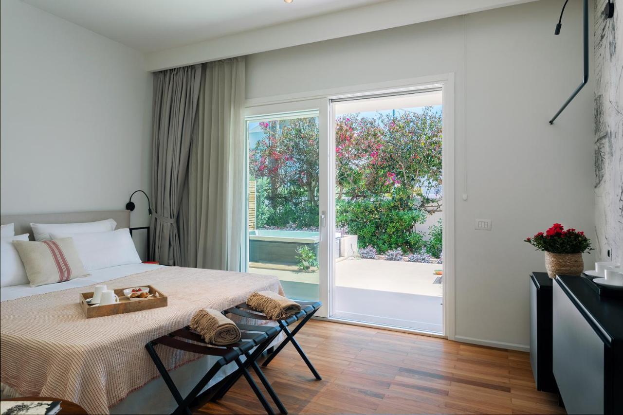 Domia Boutique Hotel E Cucina Монделло Экстерьер фото